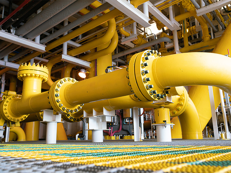 belis-oberflaechentechnik-branchen-wasserundabwassertechnik Große gelb beschichtete Rohre